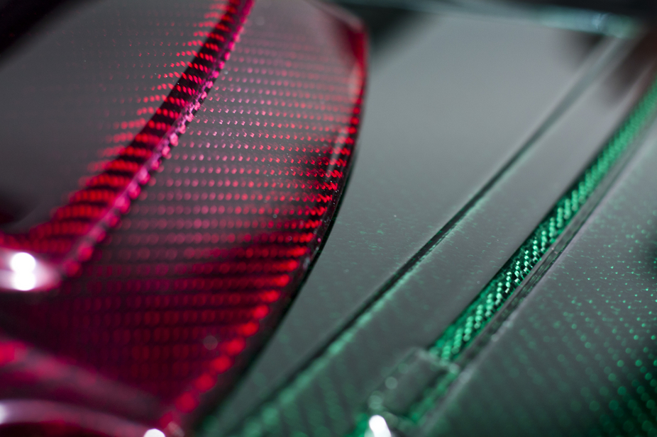 Right now, the colored carbon fiber is only available in red and green