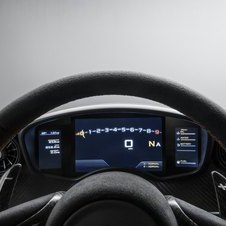 The steering wheel is modeled on McLaren's past F1 world champions