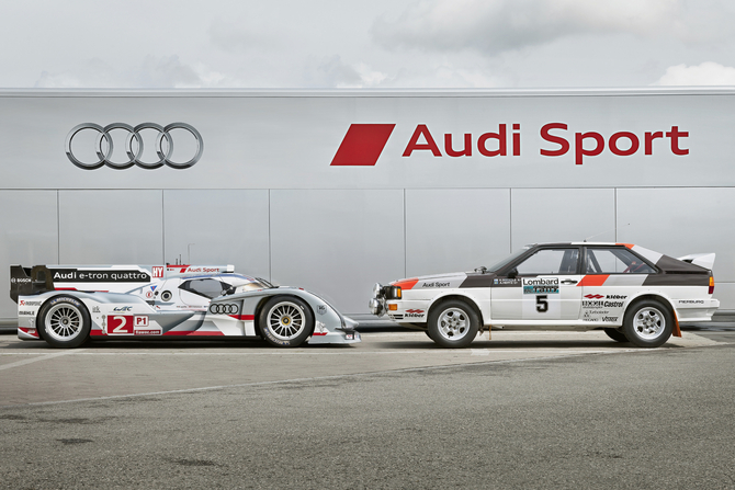 The R18 Poses with the Audi Quattro rally car The R18 Poses with the Audi Quattro rally car