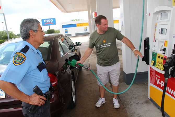 Texas Police certified the car being filled up and then sealed the gas tank Texas Police certified the car being filled up and then sealed the gas tank