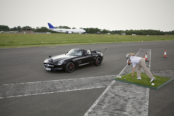 Coulthard Catches World's Longest Golf Shot into a Moving Car Coulthard Catches World's Longest Golf Shot into a Moving Car