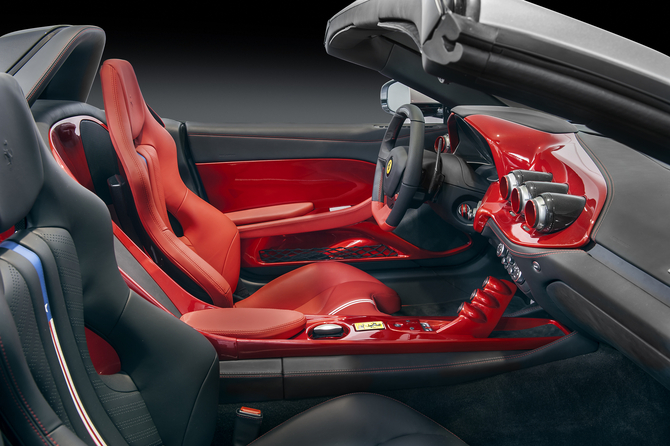 The cabin was coated asymmetrically with the driver's side in red, while the passenger side in black The cabin was coated asymmetrically with the driver's side in red, while the passenger side in black