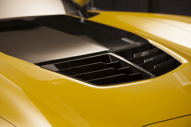 The supercharged engine sits an inch higher than the Z06 The supercharged engine sits an inch higher than the Z06