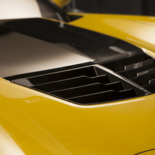 The supercharged engine sits an inch higher than the Z06