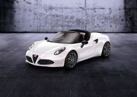 The car has a canvas roof, headlight design, rims and exhaust different from the coupé