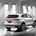 It features a wraparound tailgate with lights that extend its width