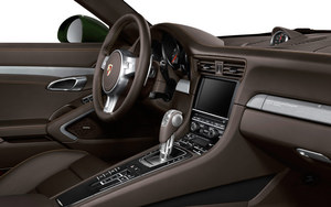 The interior gets sports seats, Espresso leather and aluminum trim
