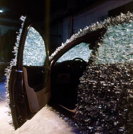 Maserati covered with 1,763 lbs of shattered glass Maserati covered with 1,763 lbs of shattered glass