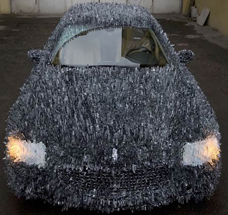 Maserati covered with 1,763 lbs of shattered glass Maserati covered with 1,763 lbs of shattered glass