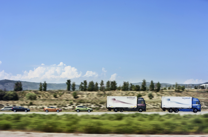 ...as the cars drive close to each other and reap the benefit of lower air drag and the reduced speed variations improve traffic flow... ...as the cars drive close to each other and reap the benefit of lower air drag and the reduced speed variations improve traffic flow...