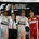 Lewis Hamilton e Kimi Raikkonen subiram ao pódio ao lado de Nico Rosberg