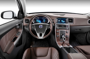 The exclusive interior features hazel-brown leather with contrasting stitching