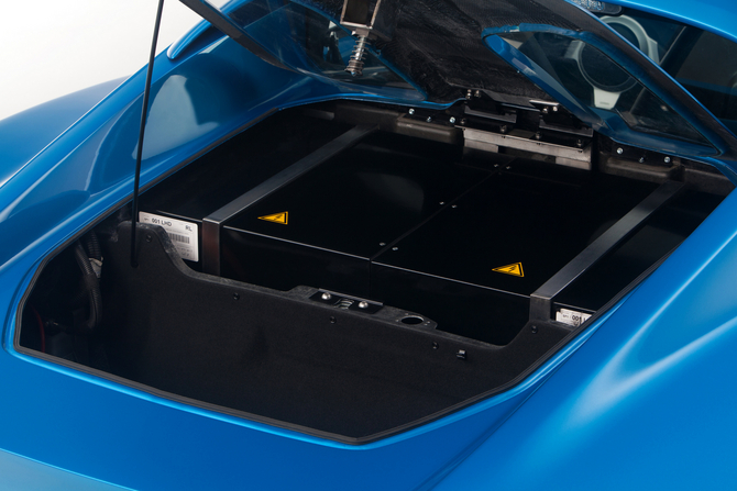 The motor and batteries are located where the engine was The motor and batteries are located where the engine was