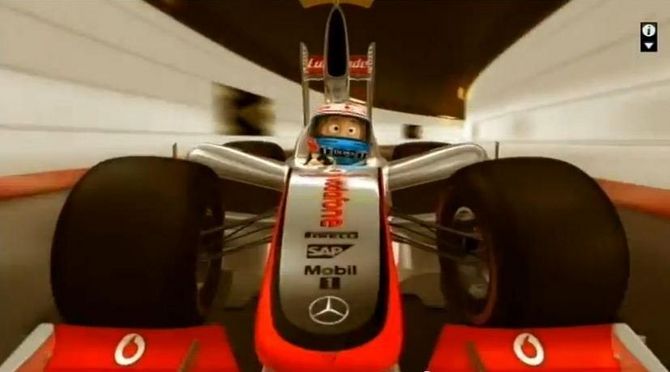 O desenho animado Jenson Button ao volante do Fórmula 1 da McLaren O desenho animado Jenson Button ao volante do Fórmula 1 da McLaren