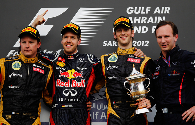 Vettel alongside Raikkonen, Grosjean and Christian Horner Vettel alongside Raikkonen, Grosjean and Christian Horner