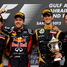 Vettel alongside Raikkonen, Grosjean and Christian Horner Vettel alongside Raikkonen, Grosjean and Christian Horner