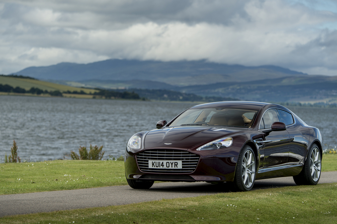 By reducing the exhaust gas back pressure, among other refinements, Aston Martin managed to slightly increase the power output of both the Vanquish an By reducing the exhaust gas back pressure, among other refinements, Aston Martin managed to slightly increase the power output of both the Vanquish an