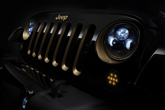 The headlights and grill of the Jeep Wrangler have been accented in gold The headlights and grill of the Jeep Wrangler have been accented in gold