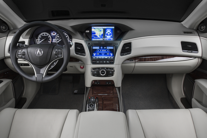 The interior does away from the gearshift in favor of push buttons to select gear The interior does away from the gearshift in favor of push buttons to select gear
