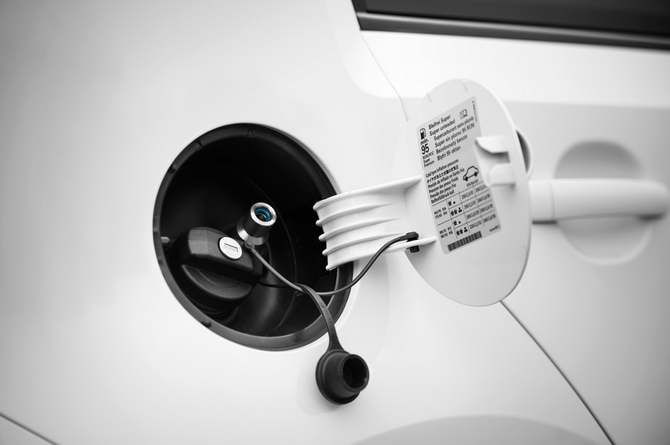 Both fillers are under the fuel filler door Both fillers are under the fuel filler door
