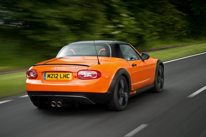 In the rear, it gets a carbon fiber diffuser and boot lid spoiler In the rear, it gets a carbon fiber diffuser and boot lid spoiler