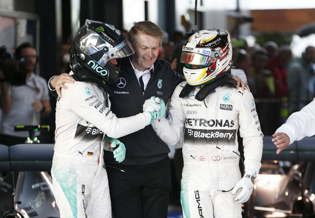 The two Mercedes drivers shaking hands at the end of the race The two Mercedes drivers shaking hands at the end of the race