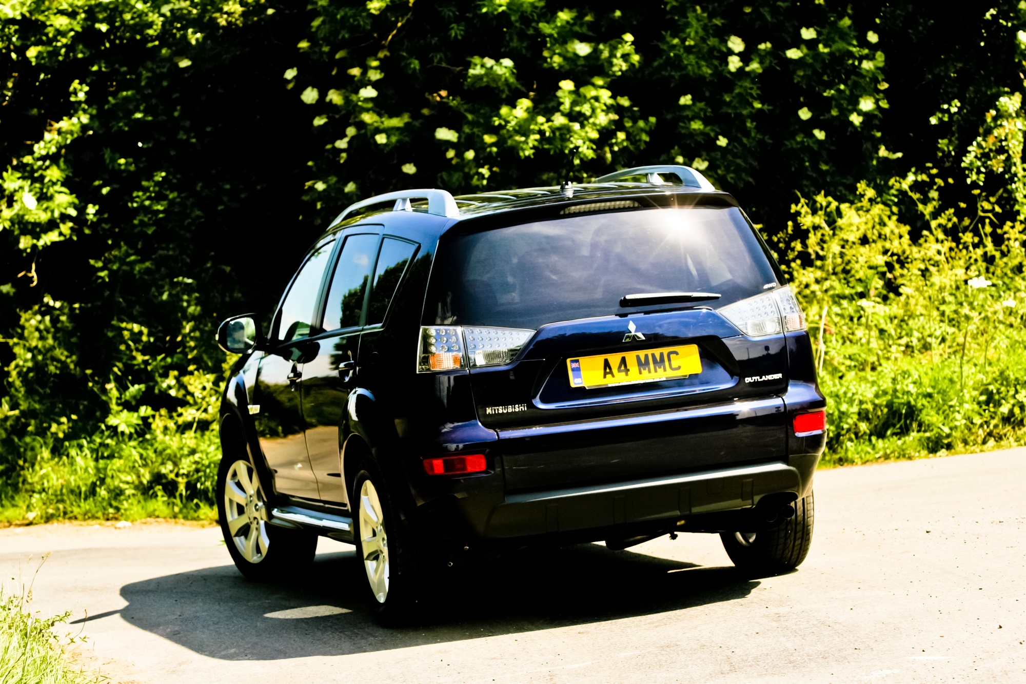 Mitsubishi outlander годы выпуска. Мицубиси Аутлендер 4. Митсубиси Аутлендер 4x4. Аутлендер 4x4 2012. Аутлендер 4x4 2010.