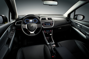 The interior is almost old fashioned compared to the other cars at Geneva