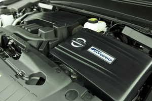 Power comes from a supercharged four-cylinder and electric motor