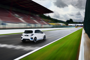 It has three electric motors - two in the rear and one between the engine and transmission