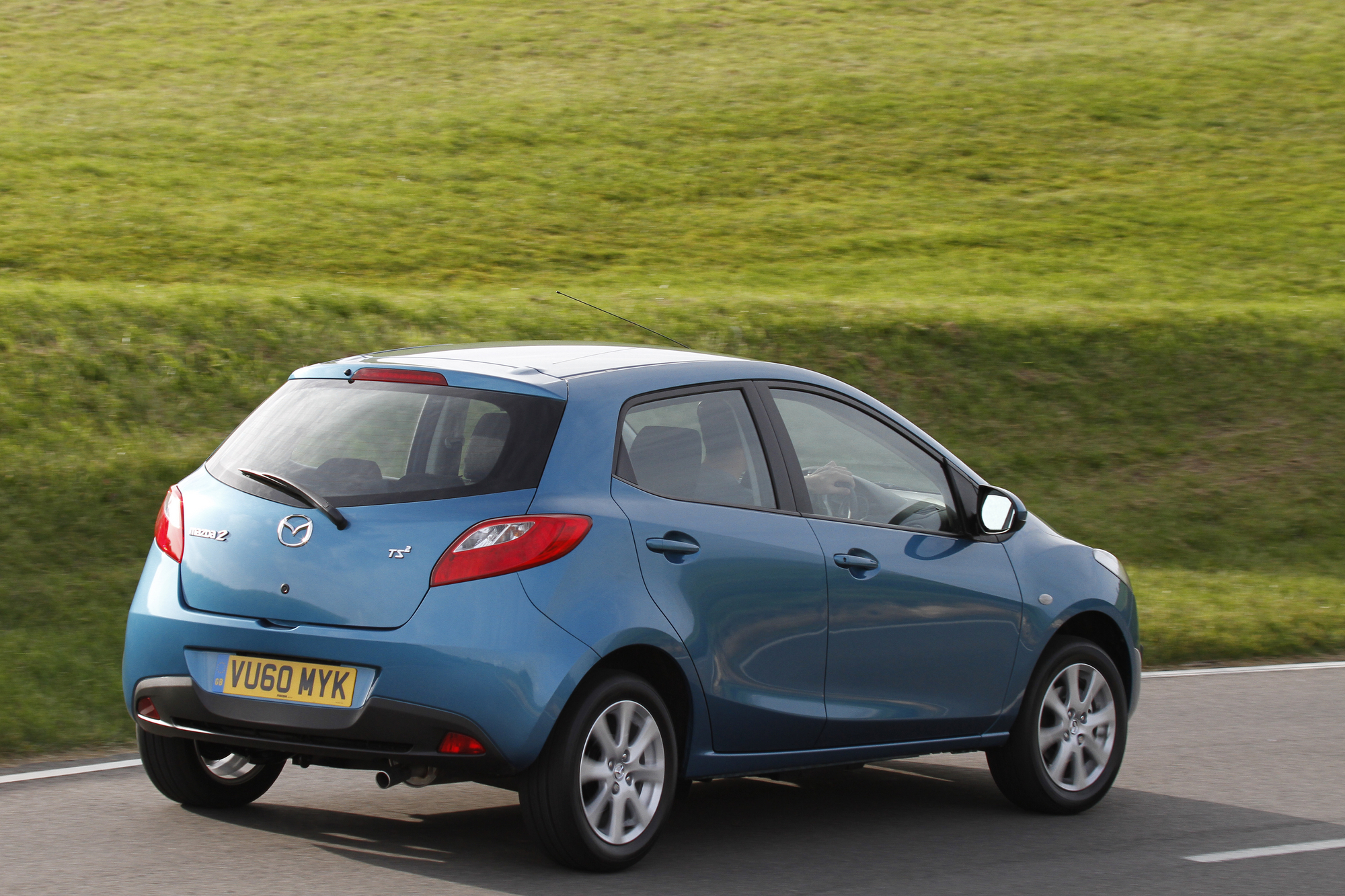 Мазда 2 инструкция. Mazda mazda2. Mazda 2. Мазда 2 2010. Мазда 2 хэтчбек.