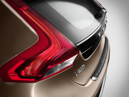 ...sculpted, contrasting sills and a contrasting rear bumper with integrated skid plate.