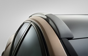 ... the anodized, black high-gloss frame around the greenhouse, the black rear-view mirror housings and the sleek rails floating over the roof.