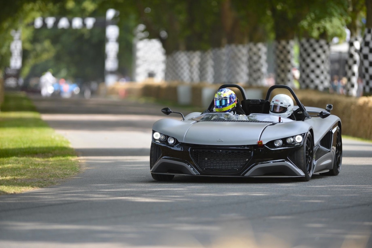 The car uses a carbon fiber or plastic body with a Ford engine