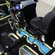 The system uses a compressed air tank under the floor to run a hydraulic motor