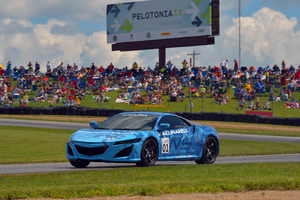 Power comes from a mid-mounted V6 with three electric motors