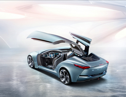 It has gull-wing doors that open to expose all four seats